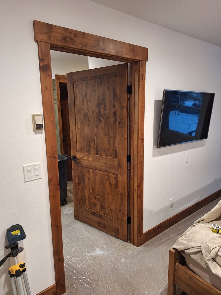Interior door installation and TV mounting in a Steamboat Springs home
